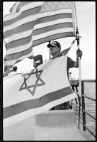 https://www.ed-templeton.com/files/gimgs/th-153_Man with flags and bible American HB pier V2.jpg